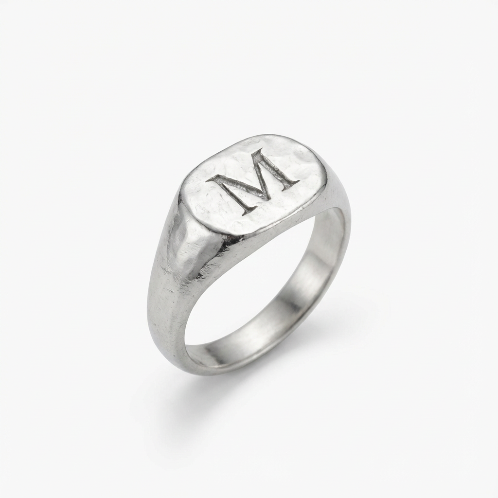 טבעת חותם מרוקעת בתוספת חריטה של אות